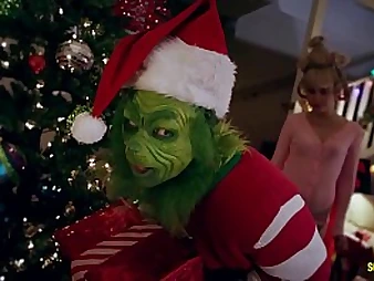 Witness Cherie Deville in undergarments & stocking get hard-core with a Grinch in a parody of Harper's Scremebox